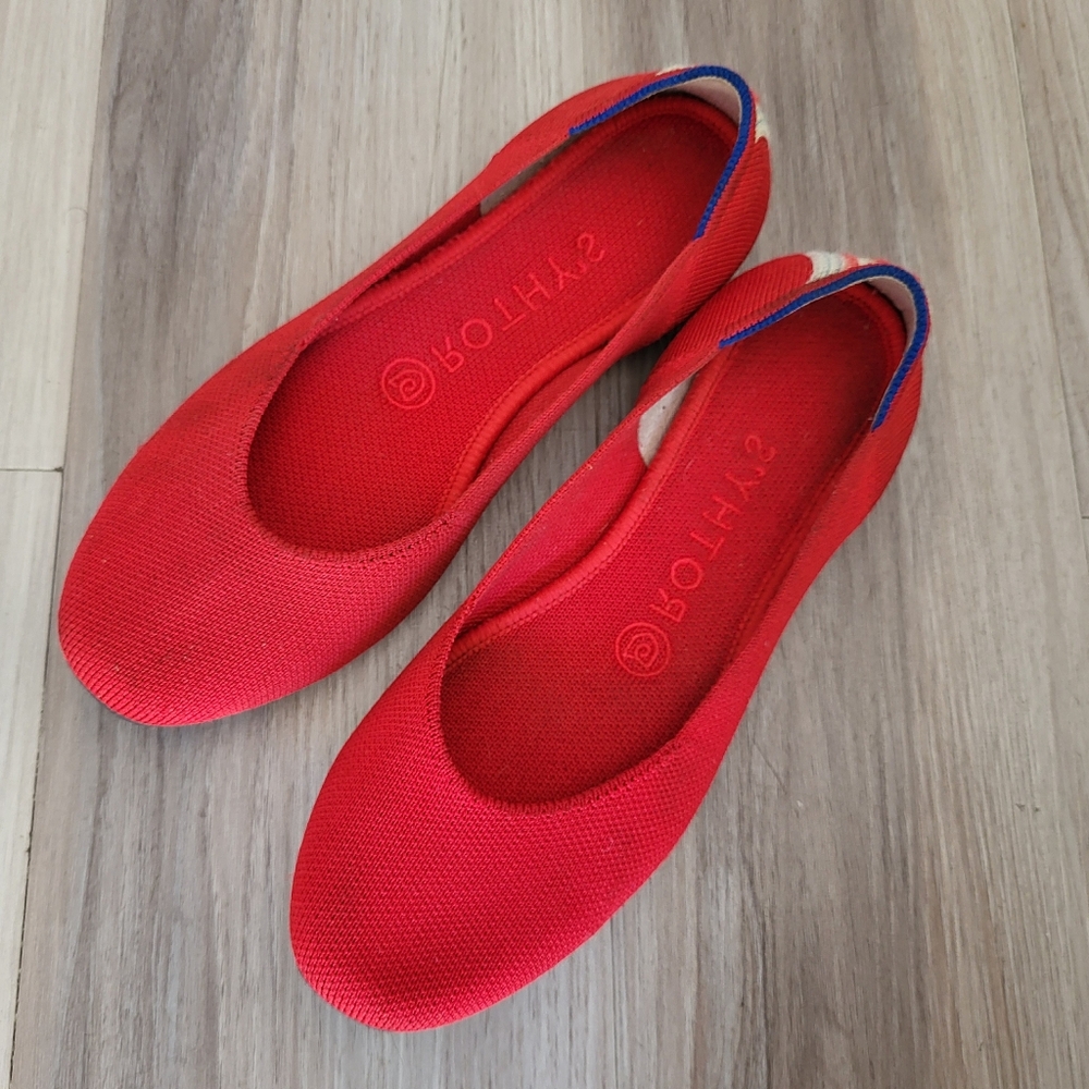 Rothy's Bold Red Flats with Blue Accents.